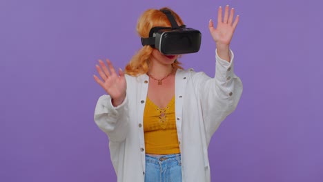 Girl-using-virtual-reality-futuristic-technology-VR-headset-helmet-to-play-simulation-3D-video-game