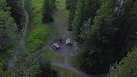 picnic tables benches in park empty squirrels running approached alberta canada