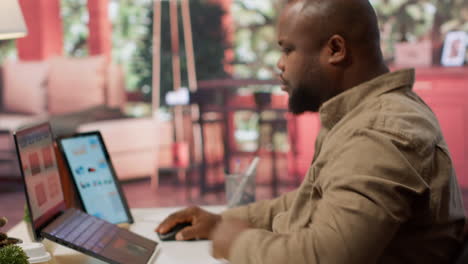 business manager writing notes to create a new investment strategy
