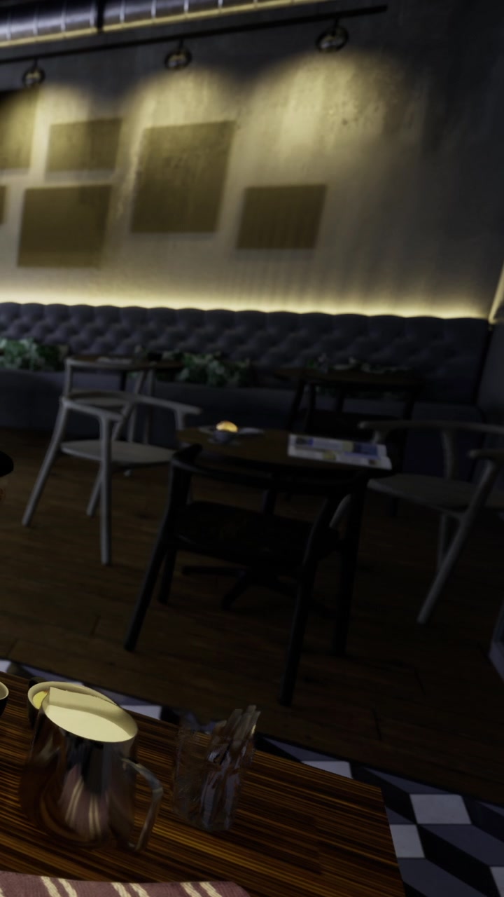 Interno di una caffetteria con tavoli e decorazioni luminose di sera.