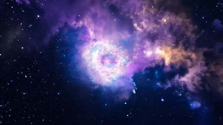 Colorful nebula rotates slowly in the vastness of outer space, showcasing vibrant hues and cosmic beauty