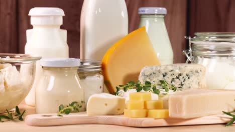 variety of dairy items displayed on wooden surface