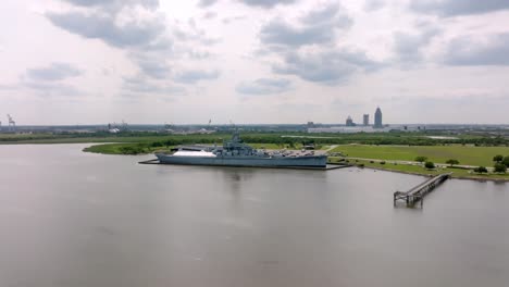 USS-Alabama-battleship-in-Mobile,-Alabama-with-drone-video-moving-in