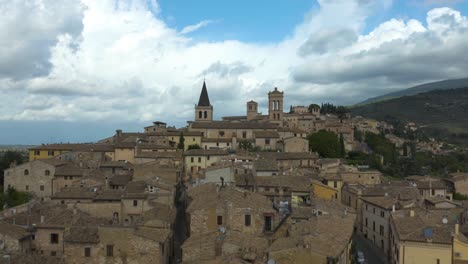 cinematic establishing shot above spello, italy in the umbria region