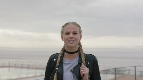 portrait of independent woman smiling posing confident wearing leather jacket