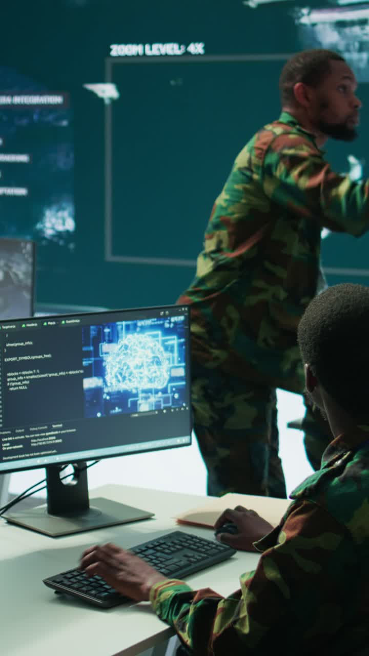 Vertical Video IT expert soldier collecting real time satellite radar data in command post