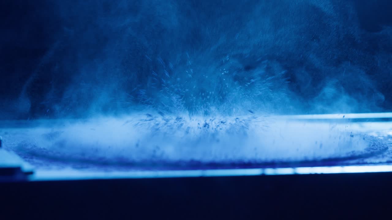 Dynamic Blue Powder Vibrating and Creating Patterns