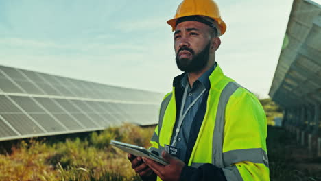 Man,-tablet-and-solar-installation-field