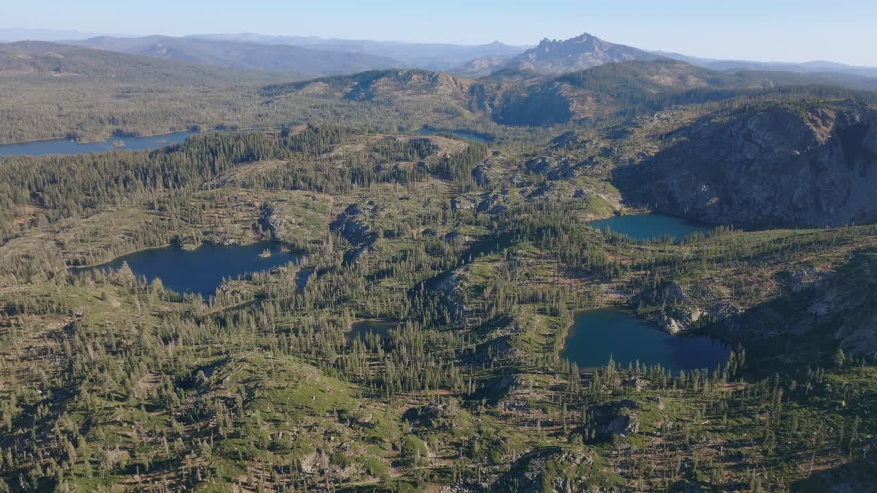 Serene aerial view of lakes in Lakes Basin, California, evokes tranquility