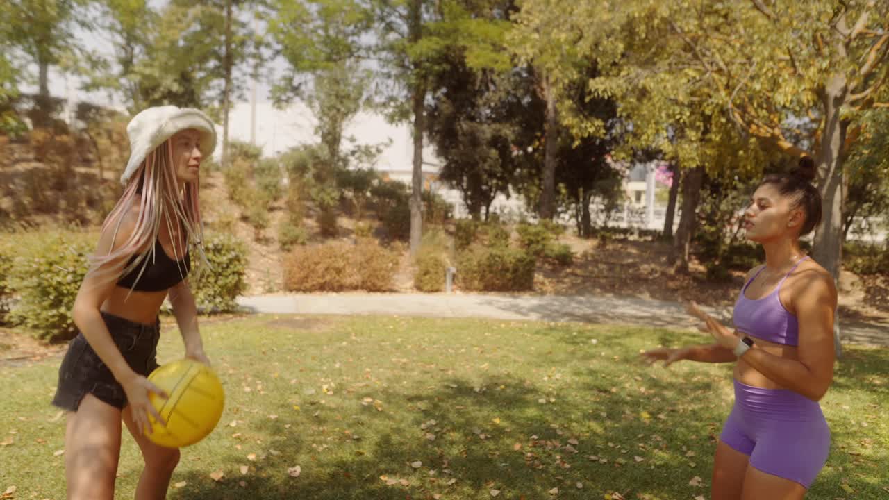 Women playing with a ball in the park