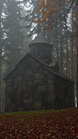 misty forest chapel in autumn