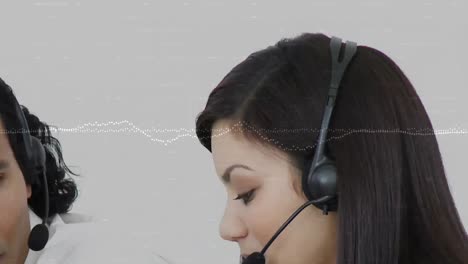 Animation-of-statistics-and-data-processing-over-business-people-using-phone-headset