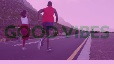 Animation of the words good vibes over couple exercising running on mountain road