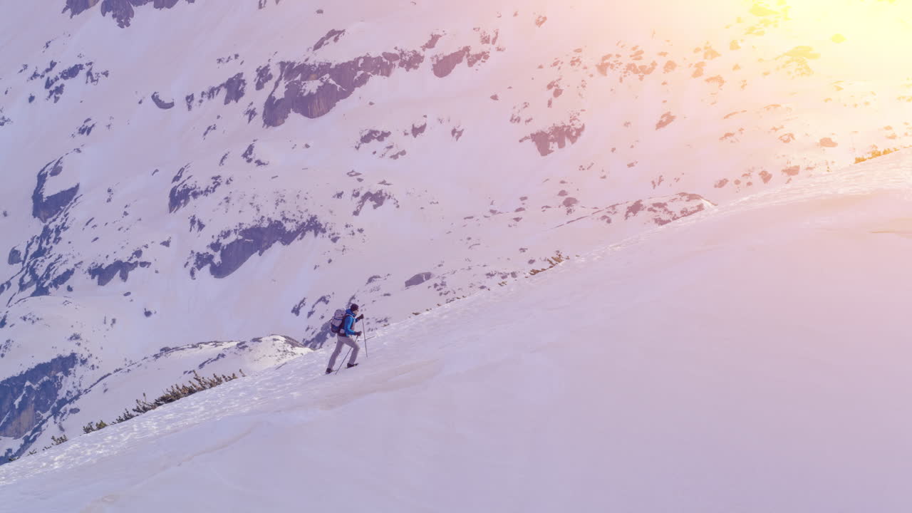 Hiker in Snowy Mountain Landscape