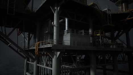 an offshore oil rig with towering pipes and structures