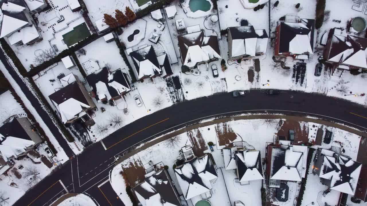 Snow-covered suburban houses and streets in Brossard, Québec, Canada, aerial view