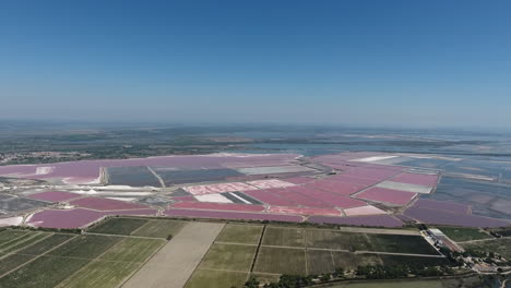 Aerial-large-view-of-salt-marches-ponds-in-Aigues-Mortes,-Camargue,-France.-Dron