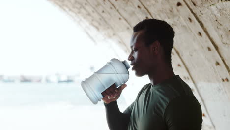 exercise, break and a black man drinking water