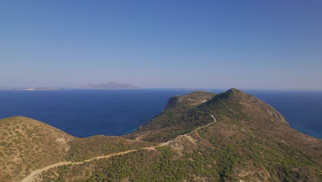 aerial view approaching mountain and blue sea, kos, greece