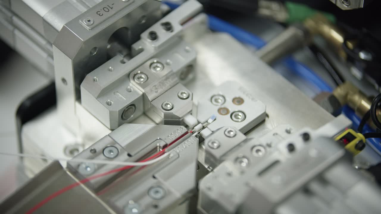 Automated unit assembling loaded temperature sensor components