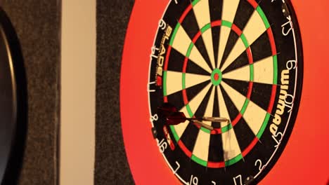 Close-up-shot-of-a-game-of-darts-throwing-at-the-triple-17-seventeen