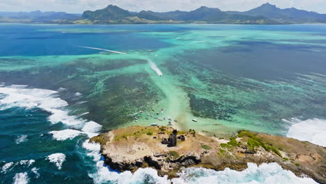 Aerial-drone-view-of-a-lighthouse-on-Ile-aux-Fouquets,-Ile-au-Phare,-Bois-des-Amourettes,-Mauritius