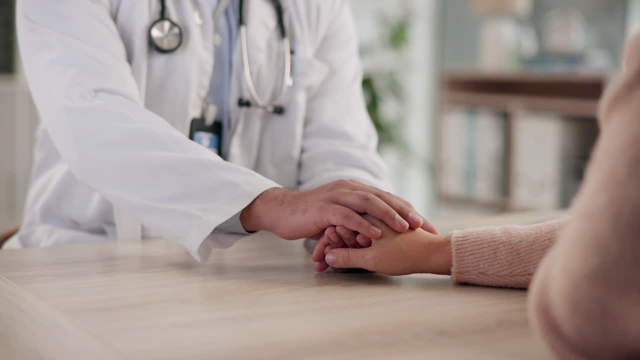 Doctor offering support and comfort to a patient