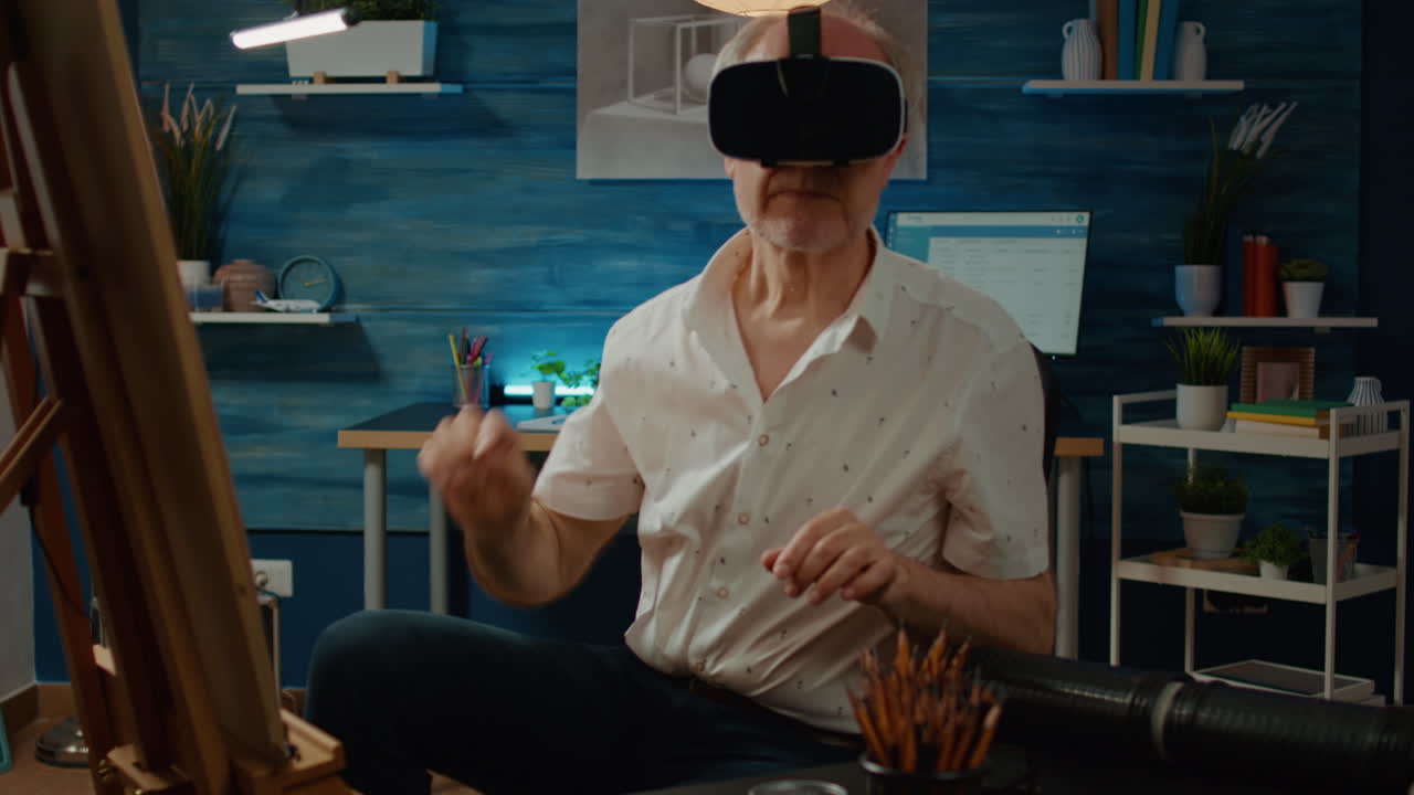 Senior artist drawing vase model with virtual reality glasses