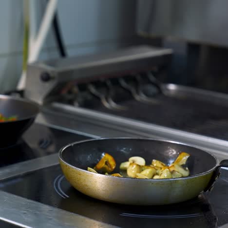 chef cooks in pan