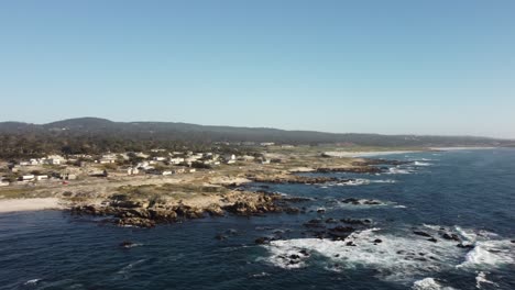 orbiting view of asilomar beach in monterey from a drone