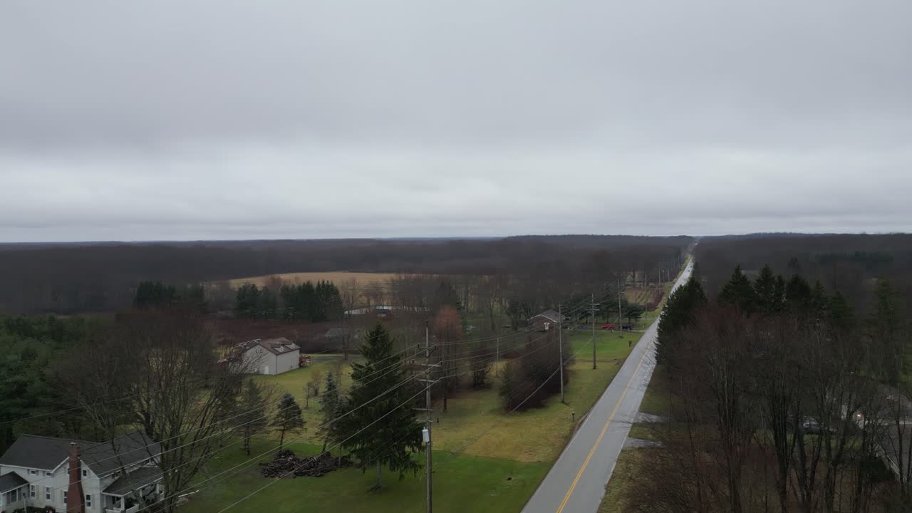 A main road cutting through the country and farms