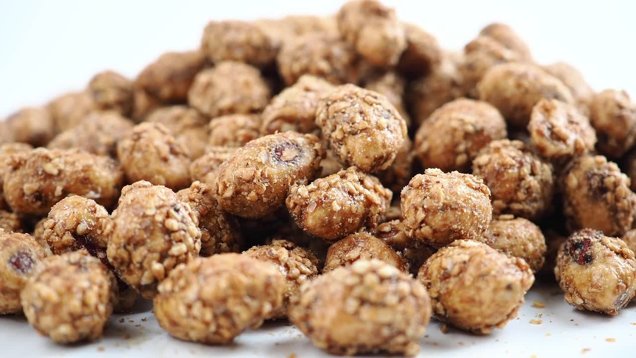 Close-up of Candied Peanuts Coated with Sesame Seeds