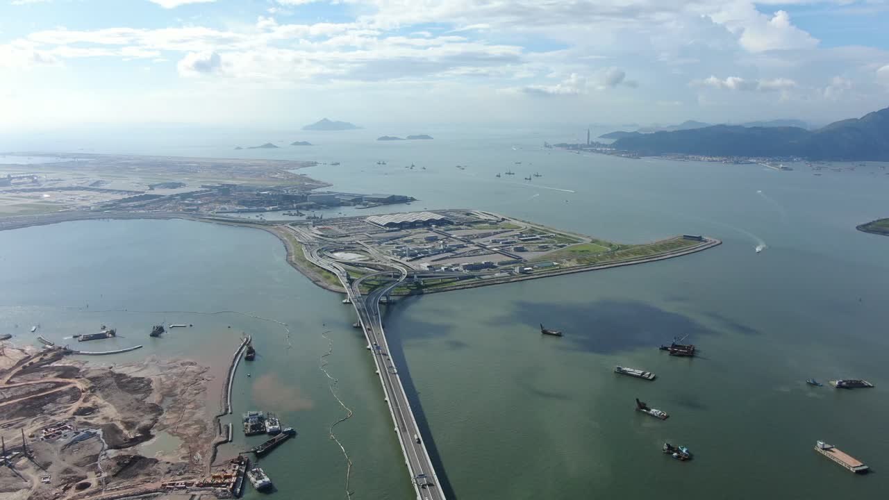 instalaciones de cruce fronterizo de hong kong y puente principal y sistema de carreteras en construcción, vista aérea