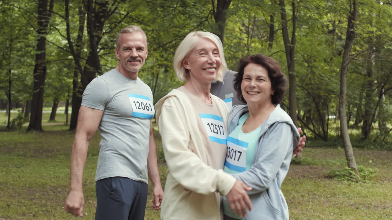 Friends Celebrating a Running Event in a Park