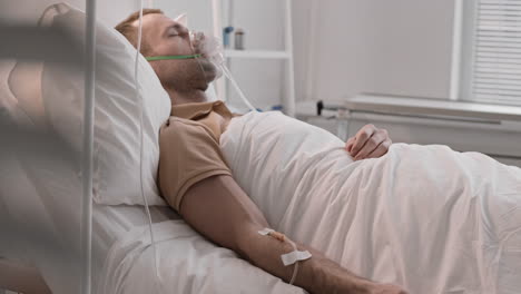 nurse checking drop counter of patient