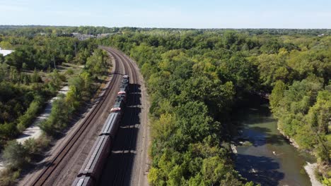 drone flying overhead following a train going through