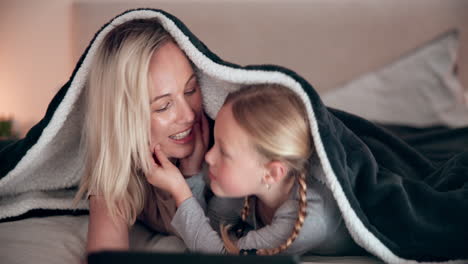 mom, daughter and tablet in bedroom