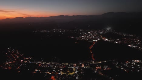 Aerial-footage-capturing-vibrant-sunsets-over-the-bays-of-Huatulco,-Mexico