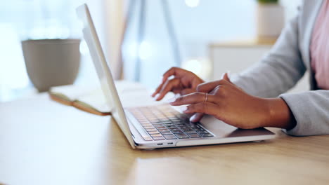 laptop, hands typing and business in office