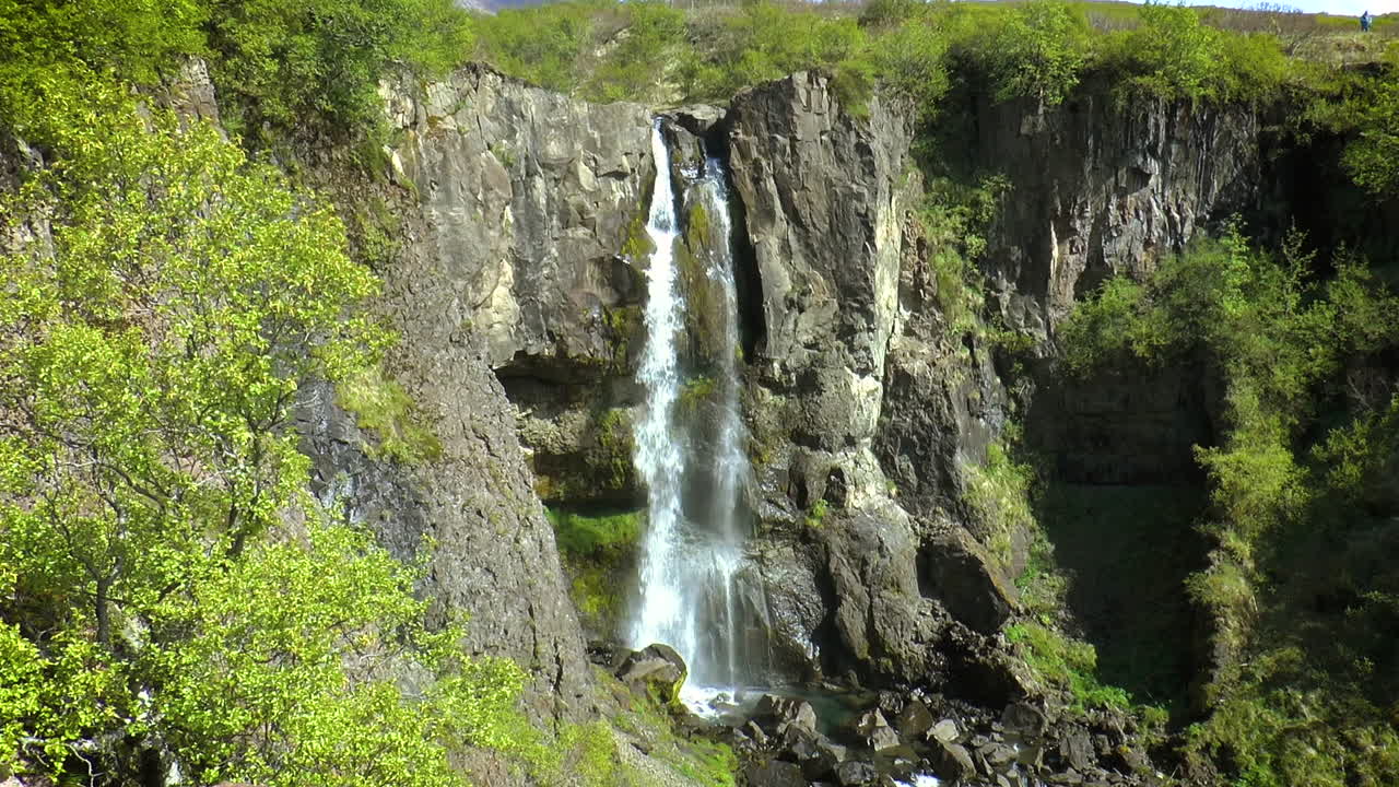 Slow motion of Icelandic waterfall - Hundafoss, located in the south of Iceland in Skaftafell in Vatnaj&ouml;kull National Park