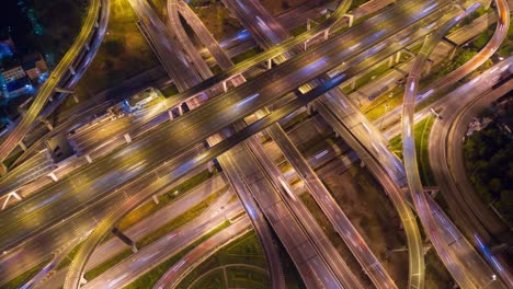 aerial hyperlapse of traffic over big intersection bridges and ring road. 4k aerial view by a drone over big roundabout in bangkok thailand.