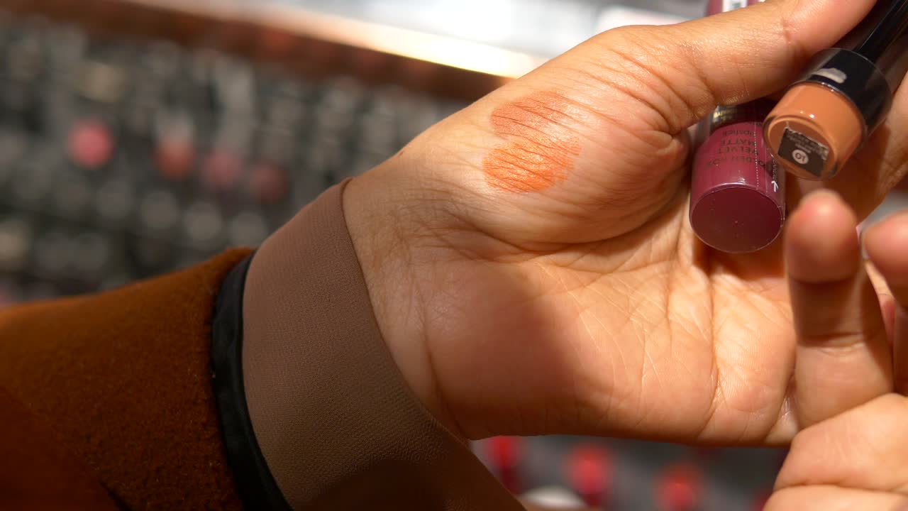 Woman Testing Lipstick Swatch