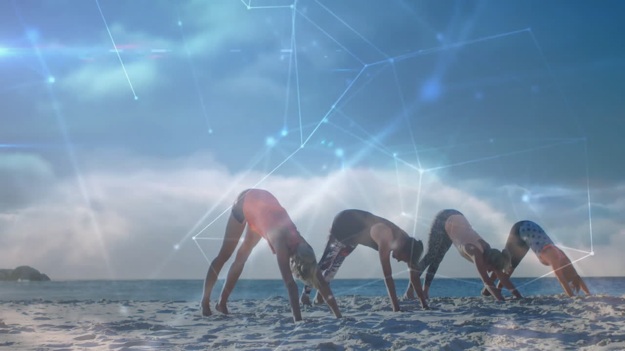 People practicing yoga on beach with digital network connections animation overlay