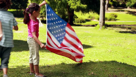 little siblings with american flag