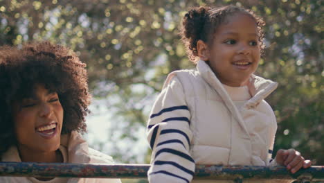 joyful mother daughter spending sunny weekend together in beautiful park closeup