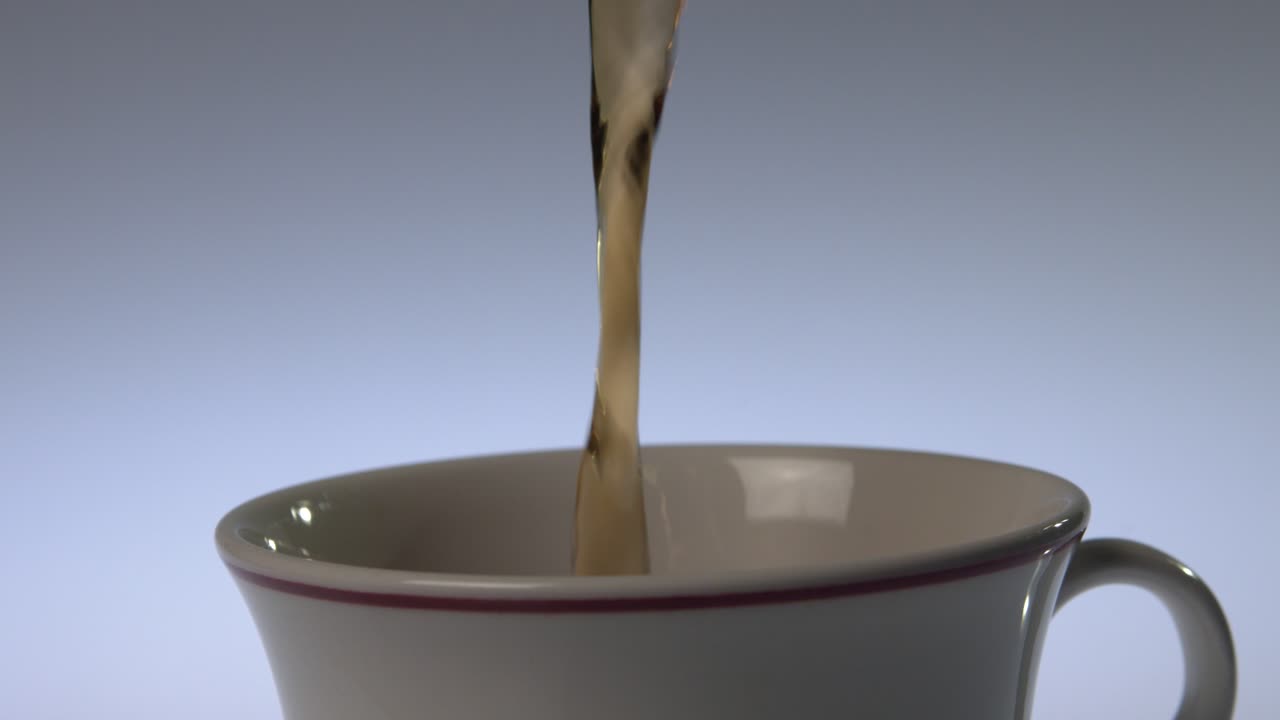 Pouring tea in slow motion