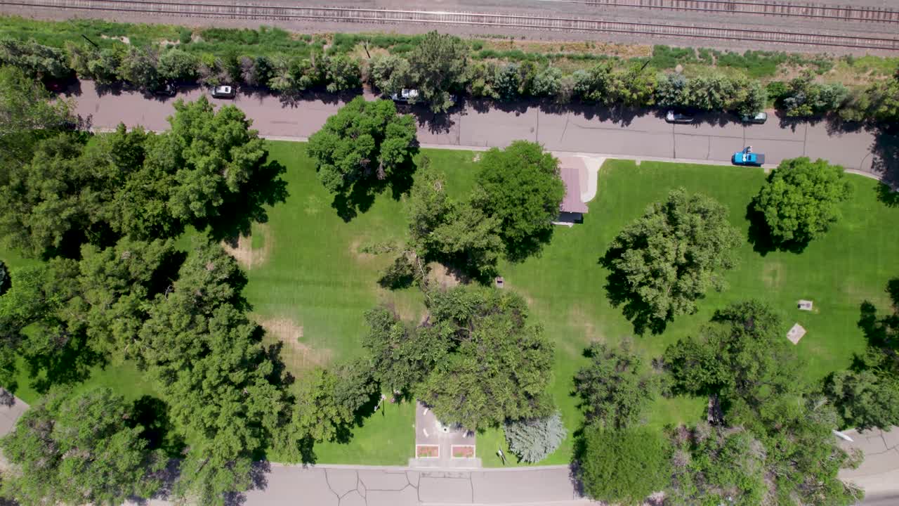 This is a an aerial video flying over Veterans park in Canon City, Colorado. Camera is looking down and flying over the park