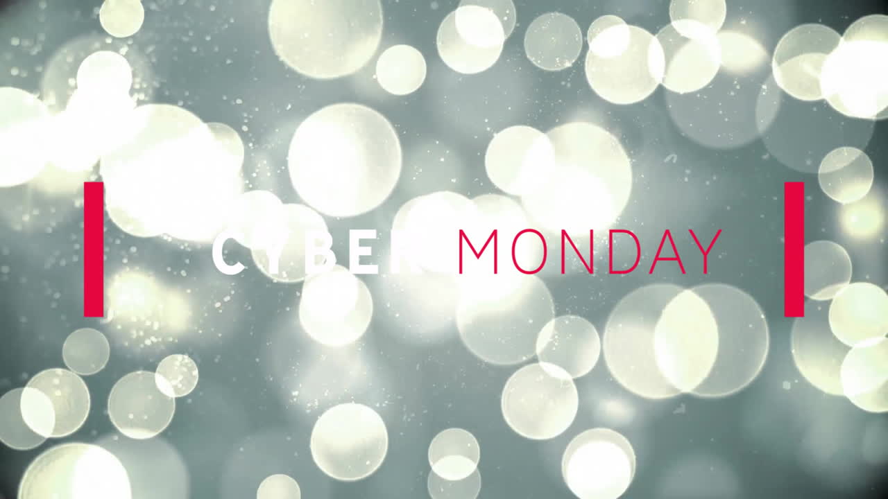 CYBER MONDAY text pulsing over flat design gray bokeh background, flanked by slim red bars