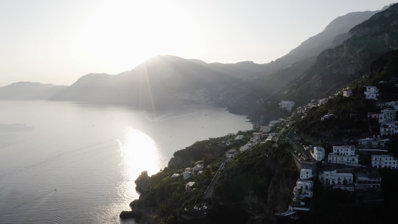 Rising aerial view of Italy's Tyrrhenian Sea on a sunny day
