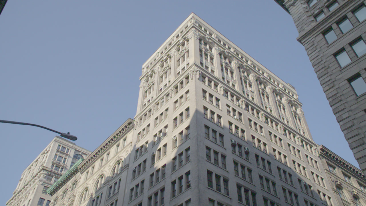 Establishing shot of a Building Exterior in Midtown Manhattan. Shot on a summer morning in New York City.